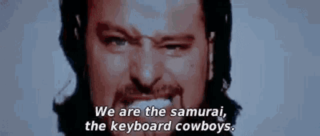 A close-up of The Plague from Hackers, with the words: ‘We are the samurai, the keyboard cowboys.’